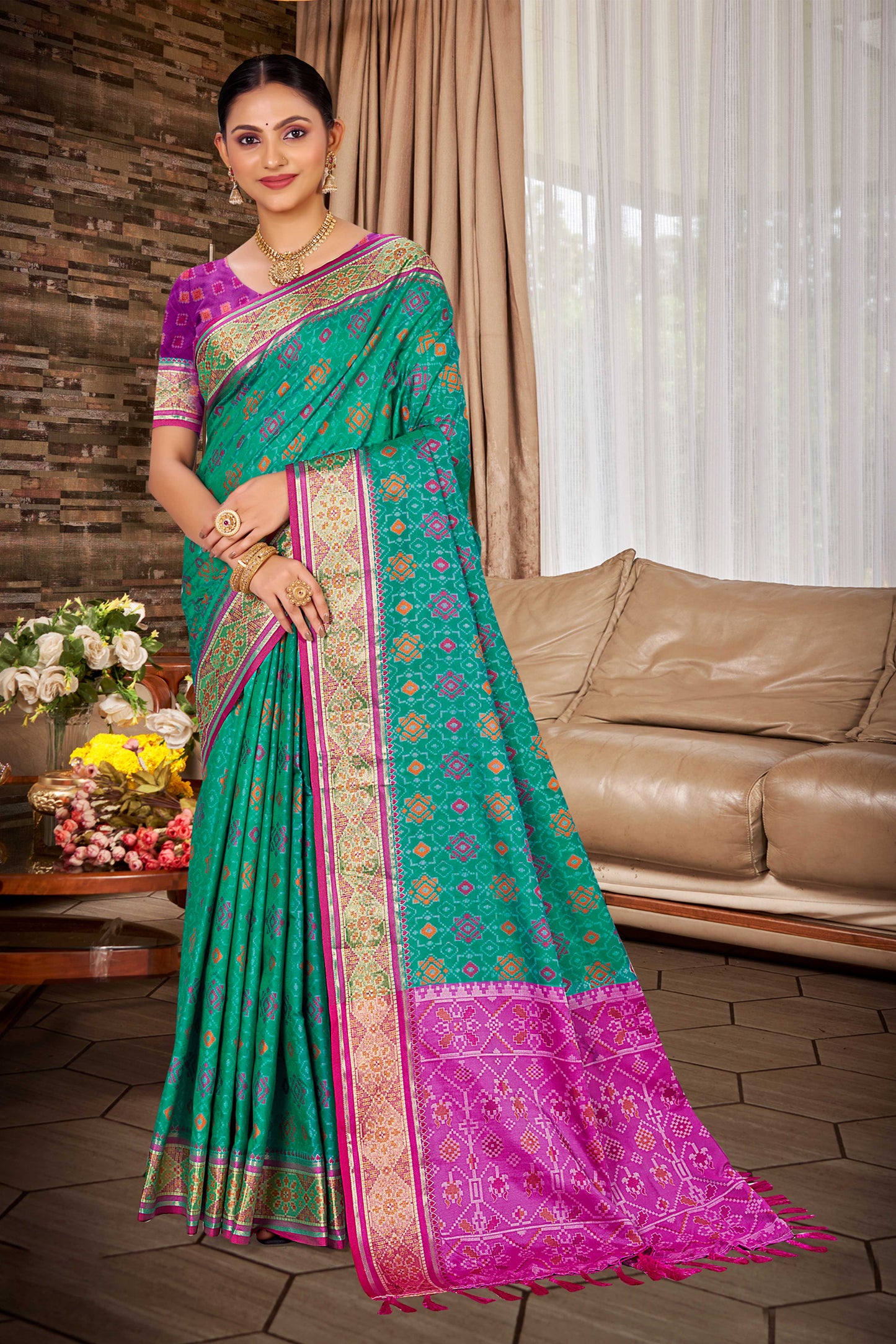 Green Patola Silk Saree with Pink Contrast Pallu Woven Designer Saree