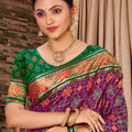 Purple Patola Silk Saree with Green Contrast Border Woven Design