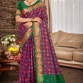 Purple Patola Silk Saree with Green Contrast Border Woven Design