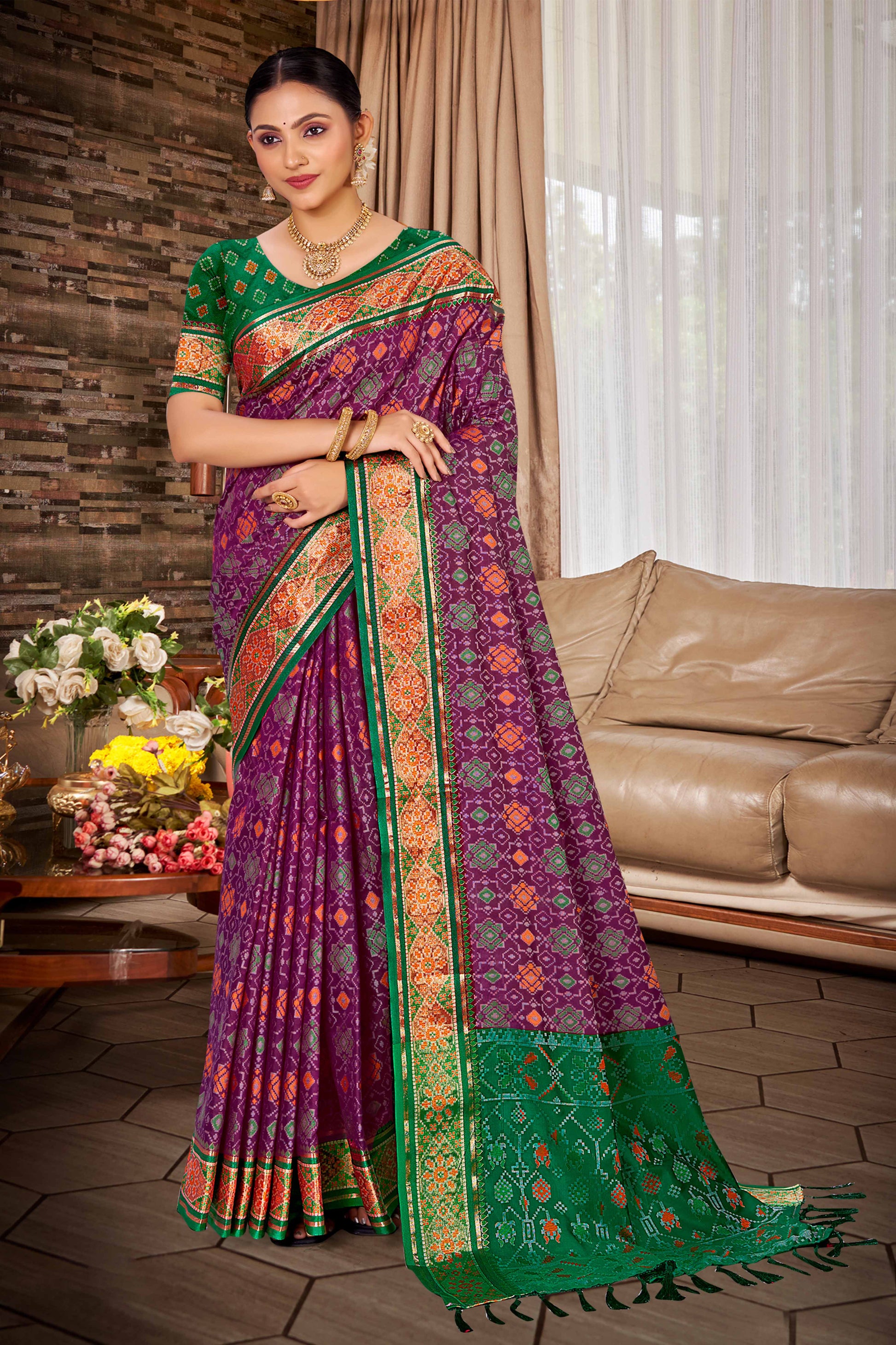 Purple Patola Silk Saree with Green Contrast Border Woven Design
