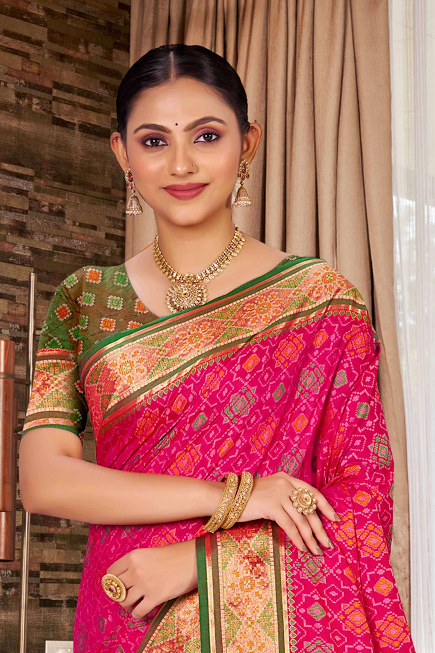 Pink Patola Silk Saree with Green Border Traditional Woven Design