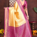 Elegant Yellow Banarasi Tissue Silk Saree with Purple Blouse for Wedding