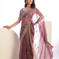 Mauve Embroidered Net Saree with Heavy Golden Border