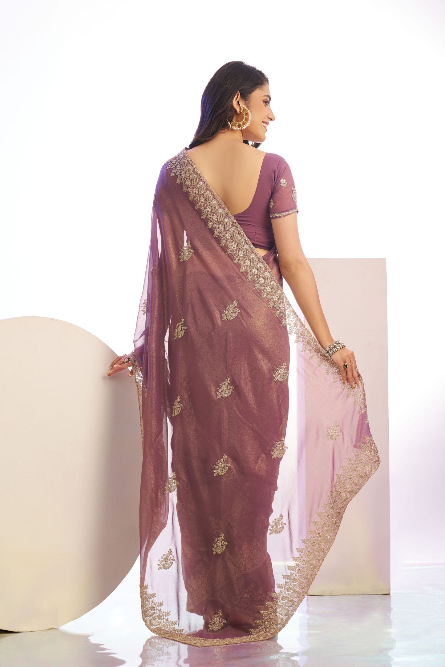 Mauve Embroidered Net Saree with Heavy Golden Border