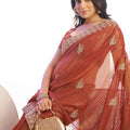 Rust Orange Embroidered Net Saree with Heavy Golden Border