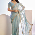 Light Blue Embroidered Net Saree with Heavy Golden Border