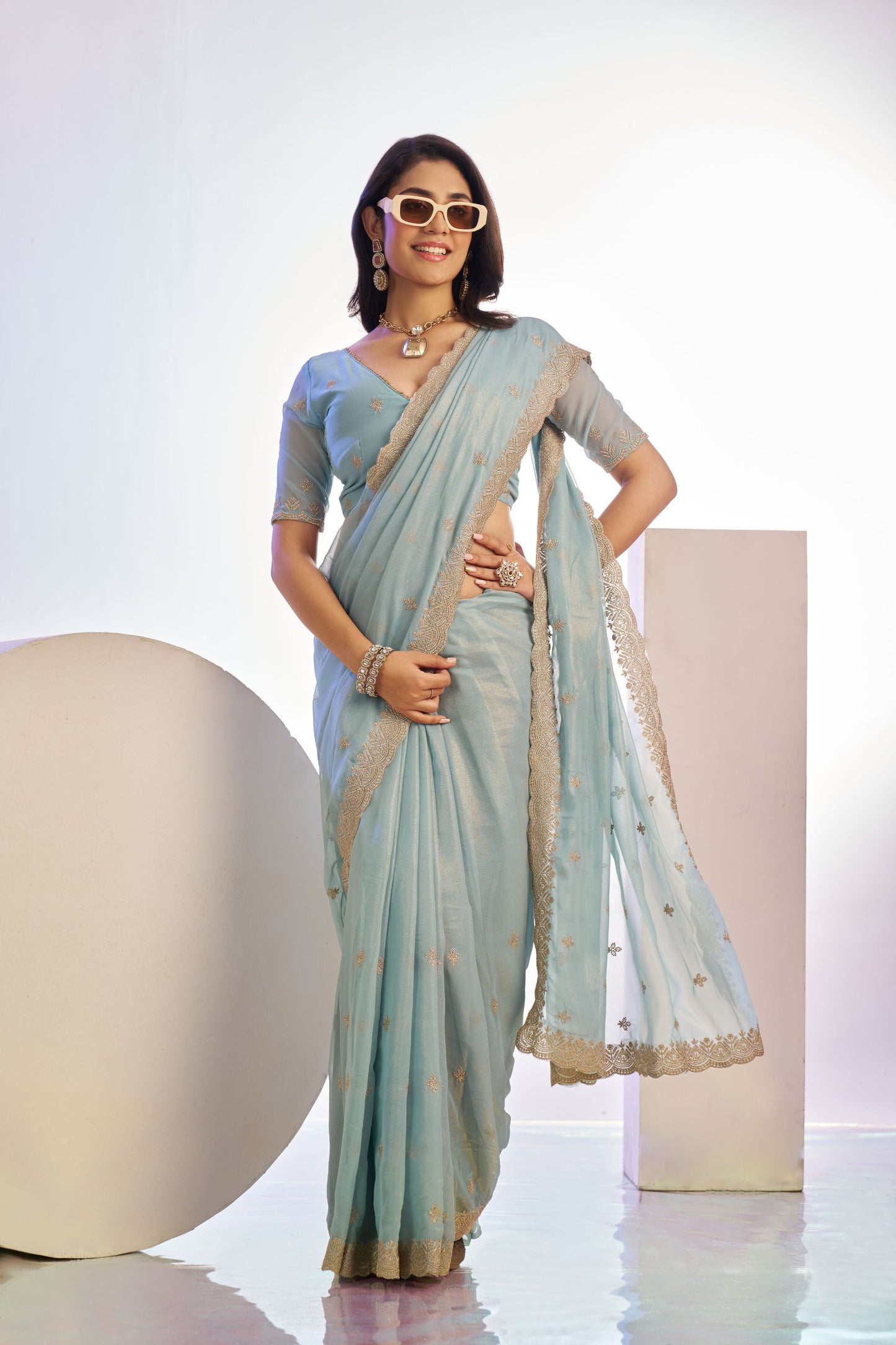 Light Blue Embroidered Net Saree with Heavy Golden Border