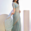 Light Blue Embroidered Net Saree with Heavy Golden Border