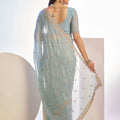 Light Blue Embroidered Net Saree with Heavy Golden Border