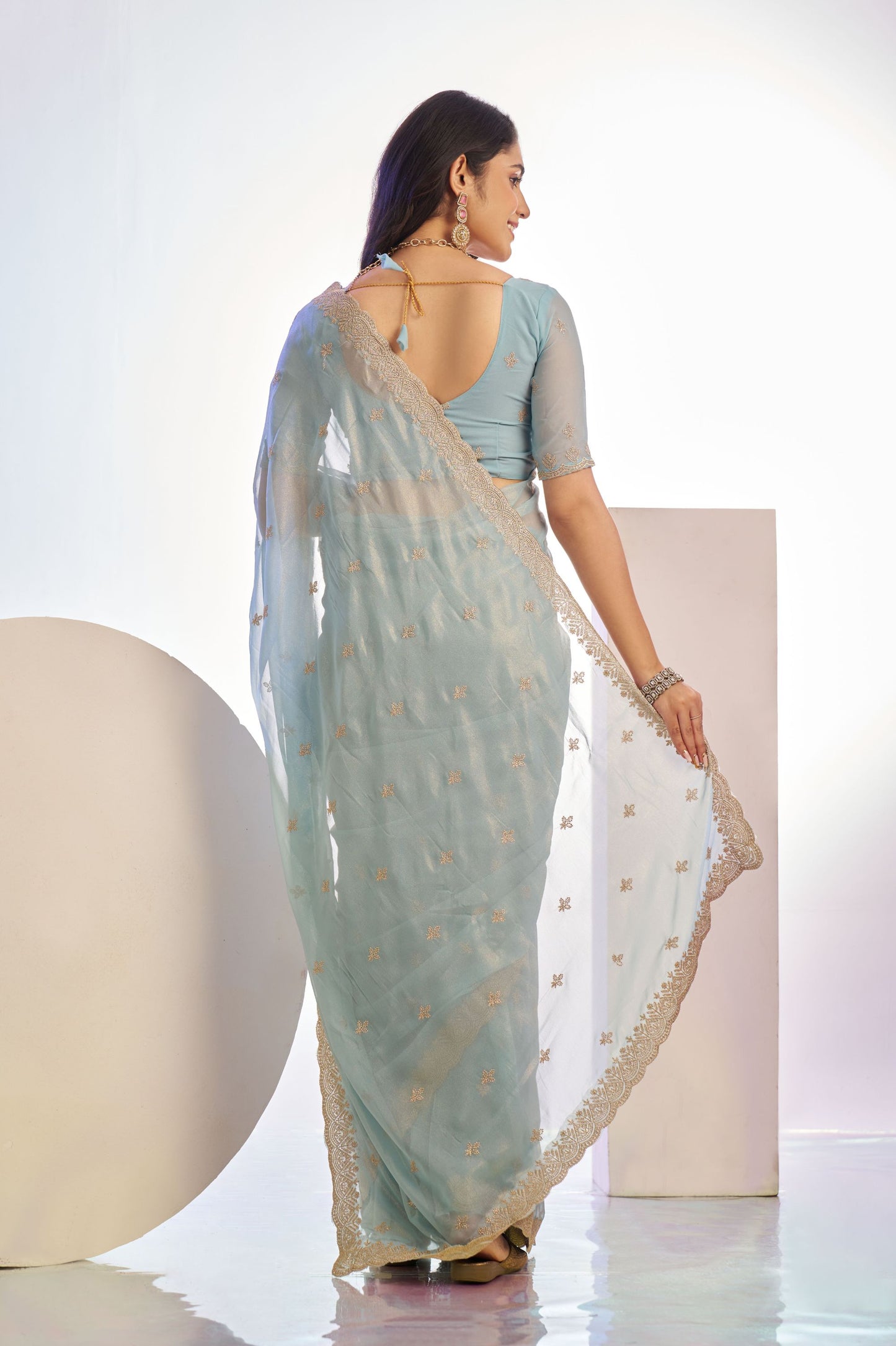Light Blue Embroidered Net Saree with Heavy Golden Border