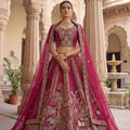 Designer Rani Pink Heavy Embroidered Silk Bridal Lehenga Choli with Net Dupatta