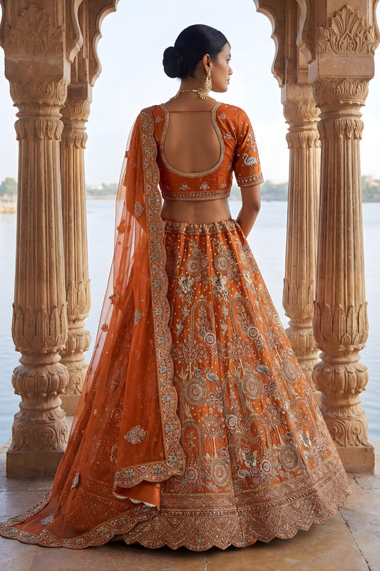 Vibrant Orange Heavy Embroidered Silk Bridal Lehenga Choli with Net Dupatta for Wedding