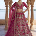 Glorious Rani Pink Heavy Embroidered Silk Bridal Lehenga Choli with Net Dupatta for Wedding