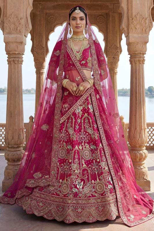 Glorious Rani Pink Heavy Embroidered Silk Bridal Lehenga Choli with Net Dupatta for Wedding