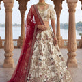 Stylish Off-White Heavy Embroidered Silk Bridal Lehenga Choli with Net Dupatta for Wedding