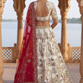 Stylish Off-White Heavy Embroidered Silk Bridal Lehenga Choli with Net Dupatta for Wedding