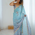 Pastel Blue Grey Floral Organza Saree with Golden Lace Border