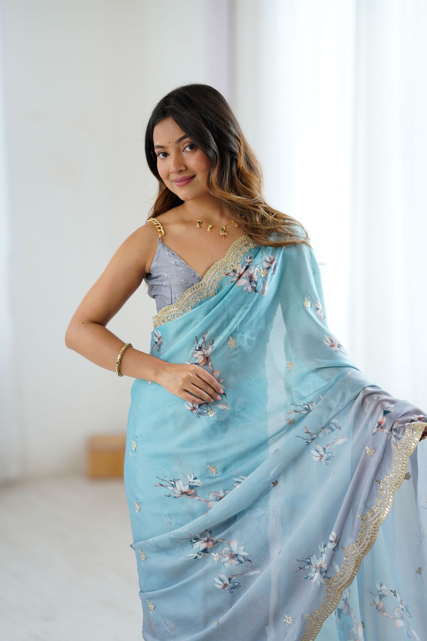 Pastel Blue Grey Floral Organza Saree with Golden Lace Border