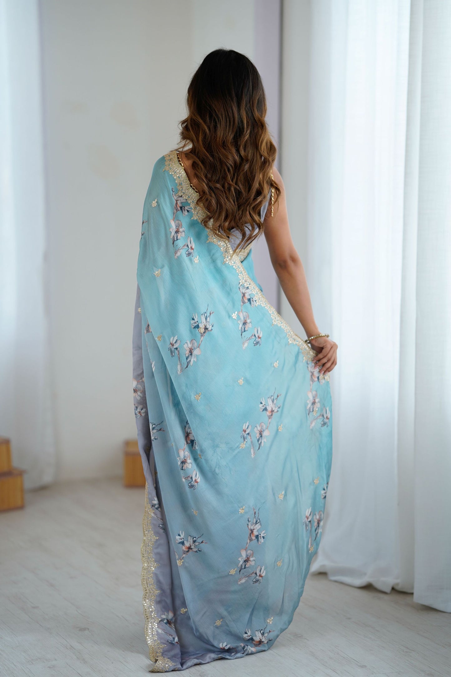 Pastel Blue Grey Floral Organza Saree with Golden Lace Border