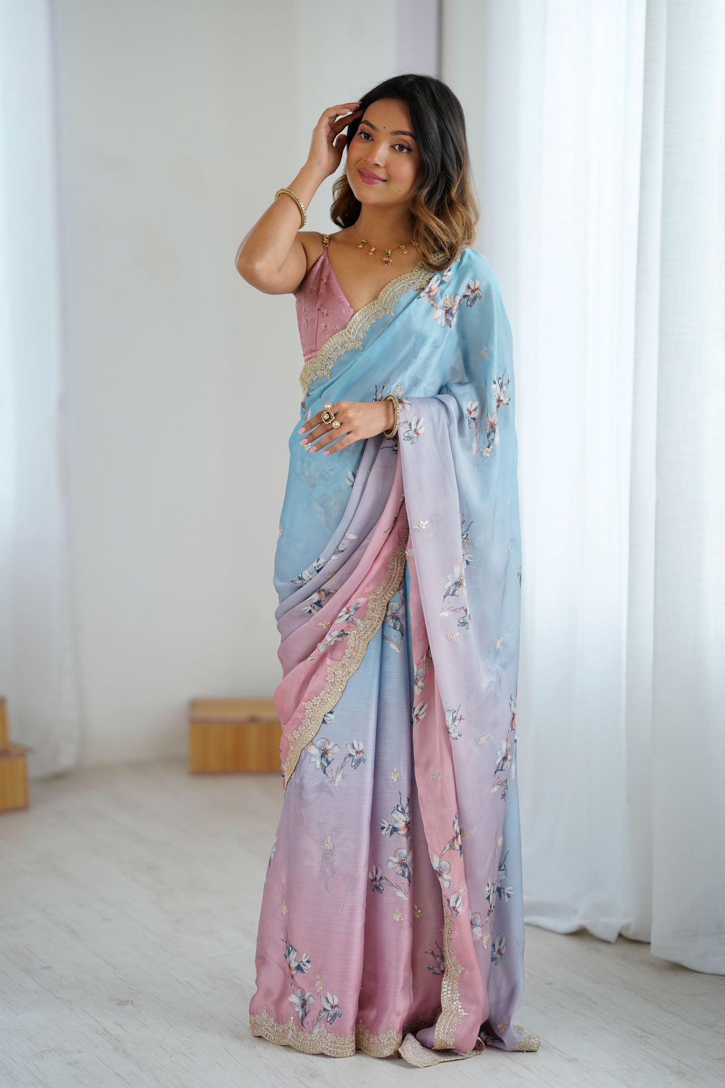 Pastel Pink Sky Blue Floral Organza Saree with Golden Lace Border