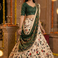 Charming Cream Art Silk Embroidered Lehenga Choli with Green Blouse and Dupatta