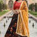 Stylish Black Art Silk Embroidered Lehenga Choli with Red Blouse and Dupatta