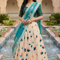 Stylish Cream Art Silk Embroidered Lehenga Choli with Teal Green Blouse and Dupatta