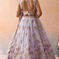 Elegant Lavender Tissue Semi-Stitched Embroidered Lehenga Choli with Dupatta