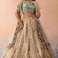 Stunning Cream Embroidered Lehenga Choli with Mint Green Blouse and Net Dupatta