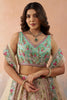 Stunning Cream Embroidered Lehenga Choli with Mint Green Blouse and Net Dupatta