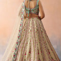 Stunning Cream Embroidered Lehenga Choli with Mint Green Blouse and Net Dupatta