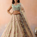 Stunning Cream Embroidered Lehenga Choli with Mint Green Blouse and Net Dupatta