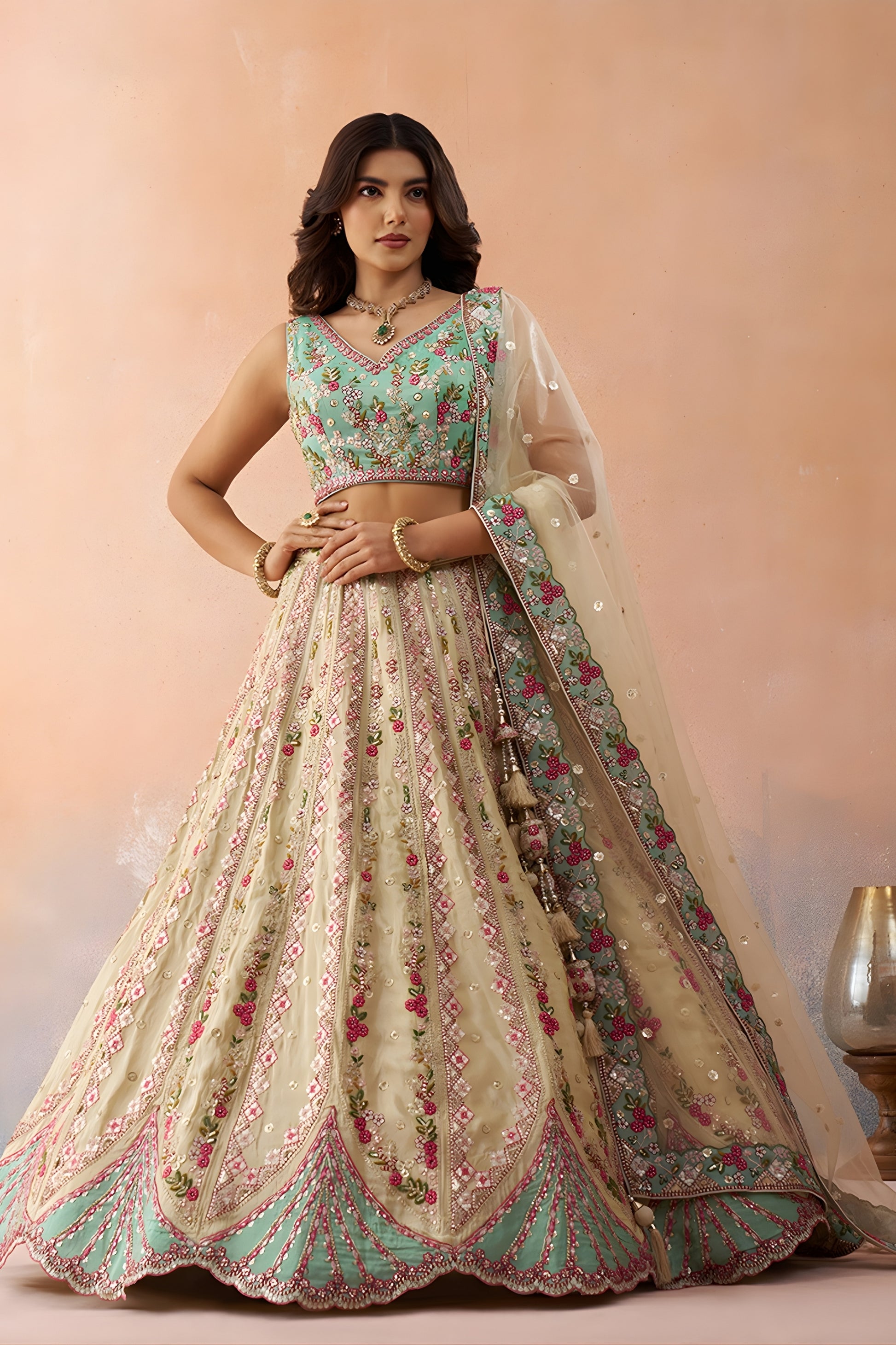 Stunning Cream Embroidered Lehenga Choli with Mint Green Blouse and Net Dupatta