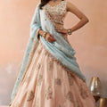 Lovely Peach Tissue Semi-Stitched Embroidered Lehenga Choli with Sky Blue Dupatta