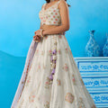 Admiring Off White Semi-Stitched Embroidered Lehenga Choli with Lavender Dupatta