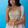 Admiring Off White Semi-Stitched Embroidered Lehenga Choli with Lavender Dupatta