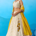 Luxury Cream Semi-Stitched Embroidered Lehenga Choli with Yellow Dupatta