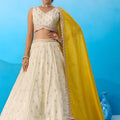Luxury Cream Semi-Stitched Embroidered Lehenga Choli with Yellow Dupatta