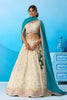 Traditional Cream Semi-Stitched Embroidered Lehenga Choli with Teal Green Dupatta