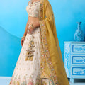 Amazing Cream Semi-Stitched Embroidered Lehenga Choli with Mustard Yellow Dupatta