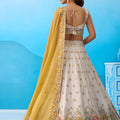 Amazing Cream Semi-Stitched Embroidered Lehenga Choli with Mustard Yellow Dupatta