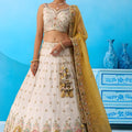 Amazing Cream Semi-Stitched Embroidered Lehenga Choli with Mustard Yellow Dupatta