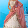 Lovable Cream Semi-Stitched Embroidered Lehenga Choli with Pink Dupatta