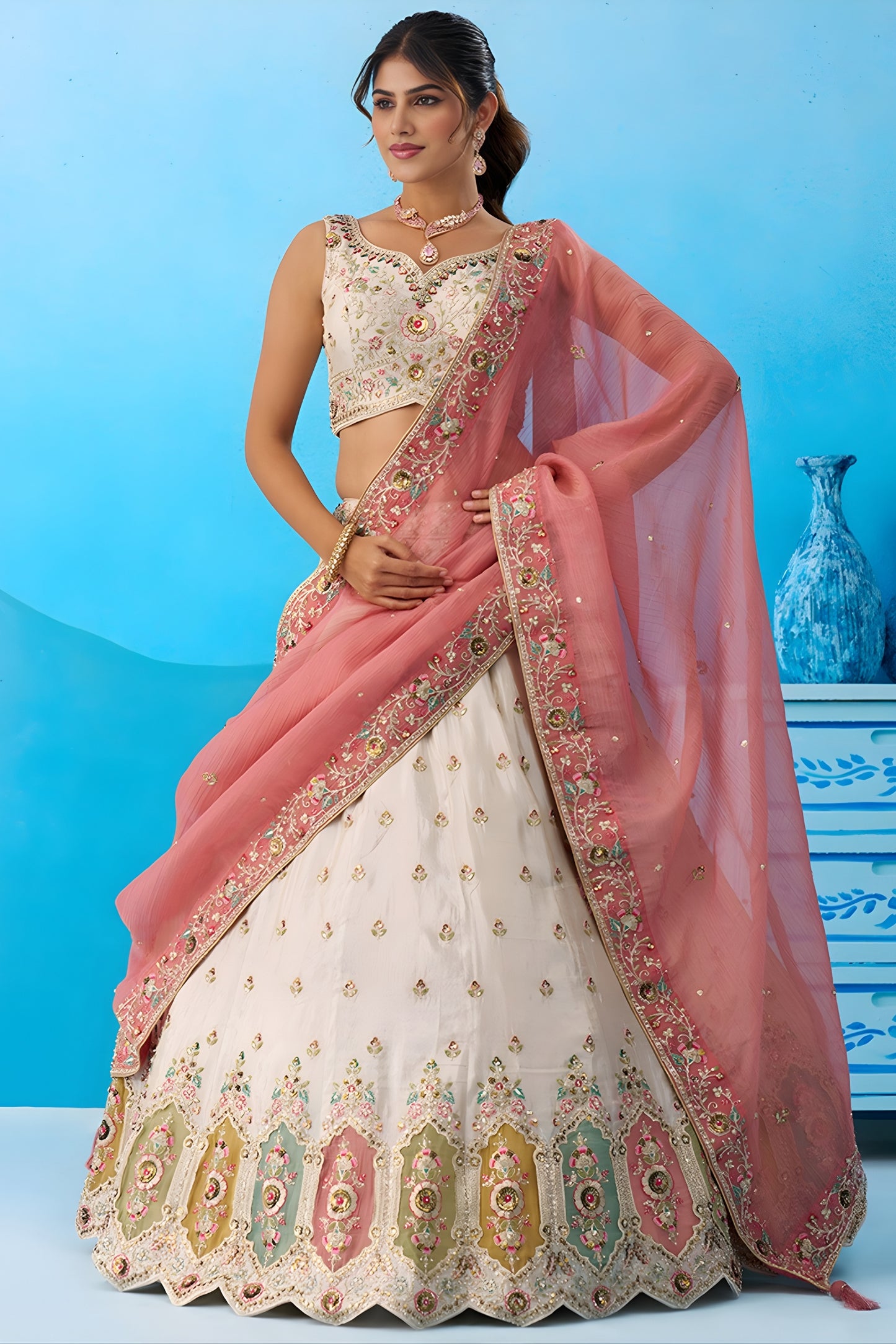 Lovable Cream Semi-Stitched Embroidered Lehenga Choli with Pink Dupatta