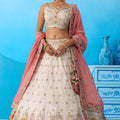 Lovable Cream Semi-Stitched Embroidered Lehenga Choli with Pink Dupatta