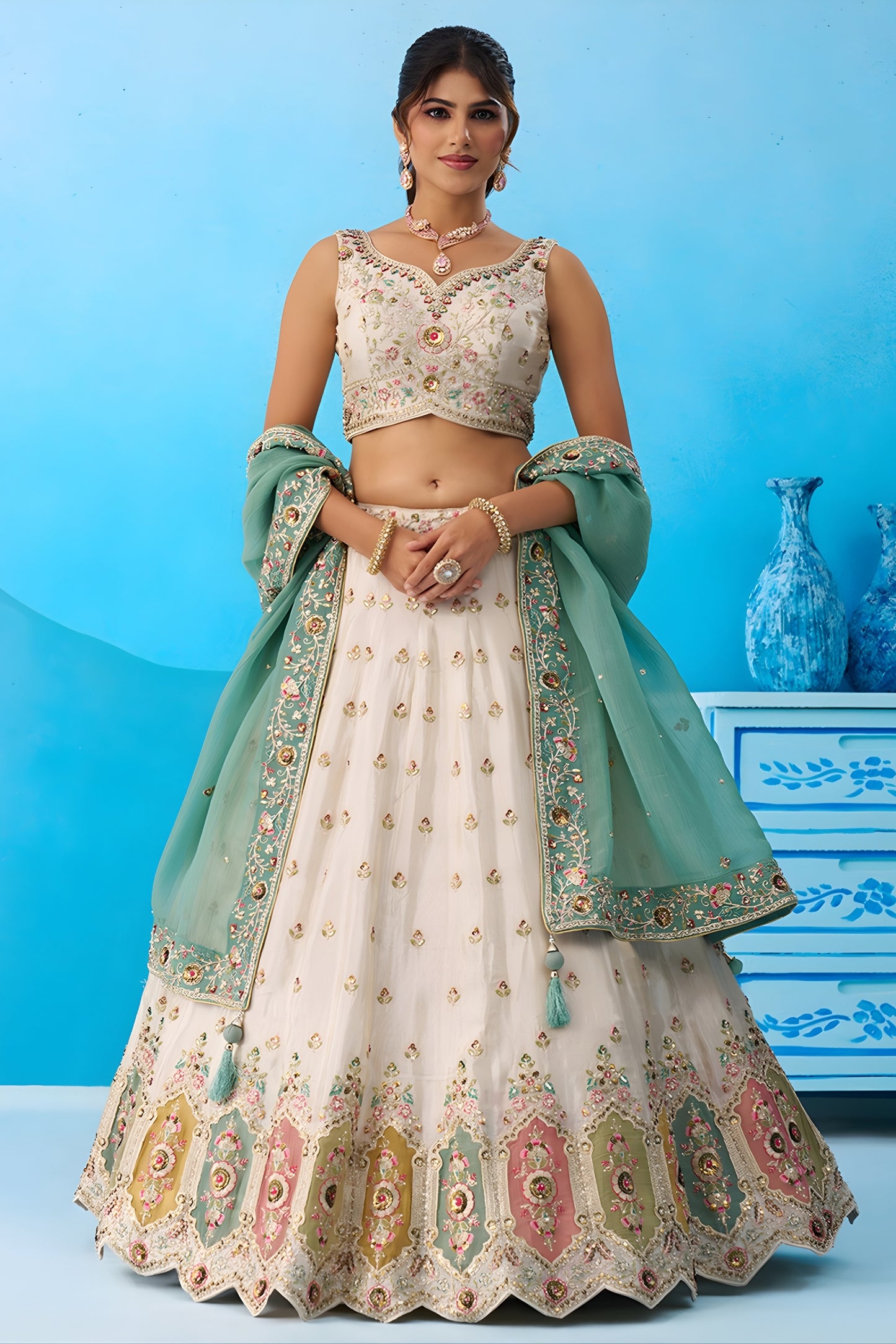Beautiful Cream Semi-Stitched Embroidered Lehenga Choli with Sea Green Dupatta