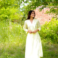 Outstanding Off-White Cotton Co-Ord Set with V-Neck 3/4 Sleeve Kurta and Straight Pants