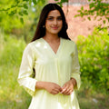 Outstanding Off-White Cotton Co-Ord Set with V-Neck 3/4 Sleeve Kurta and Straight Pants