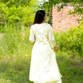 Outstanding Off-White Cotton Co-Ord Set with V-Neck 3/4 Sleeve Kurta and Straight Pants