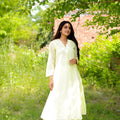 Outstanding Off-White Cotton Co-Ord Set with V-Neck 3/4 Sleeve Kurta and Straight Pants